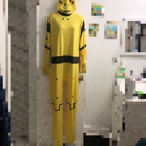 Yellow and black crash test dummy Spirit Halloween costume